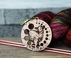 Knitting Needle Gauge Guide with a sheep standing on a grassy hill - Cherry wood with bronze clasp