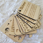 Keychain Knitting Tools for measuring gauge, measuring knitting needles, instructions for stitches, measuring yarn, and sizing help