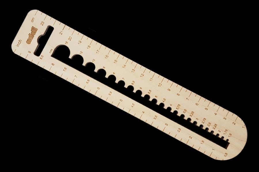 Addi Calibro Wooden Needle Gauge Set, allows accurate sizing for all Skacel by Addi (N America) knitting needles and crochet hooks.